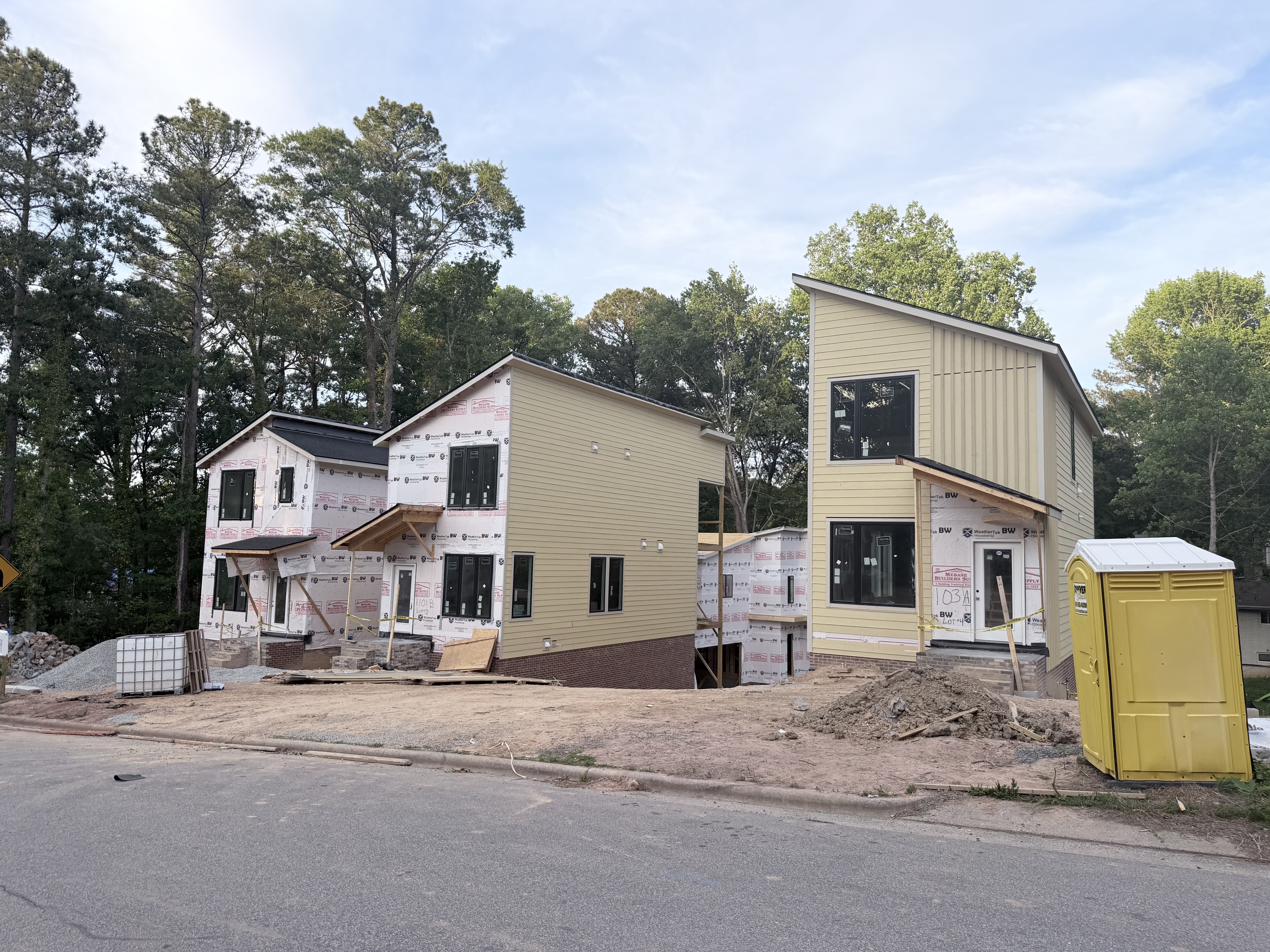 Side view of Lot 2 showing three-story profile and deck structure